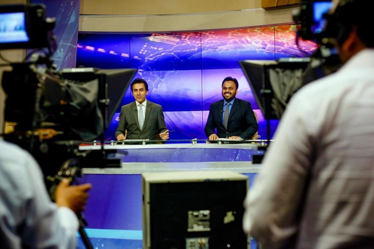 Anchomen deliver the news in the studios of Pakistan Television, the government-run TV network, in Islamabad, Pakistan.