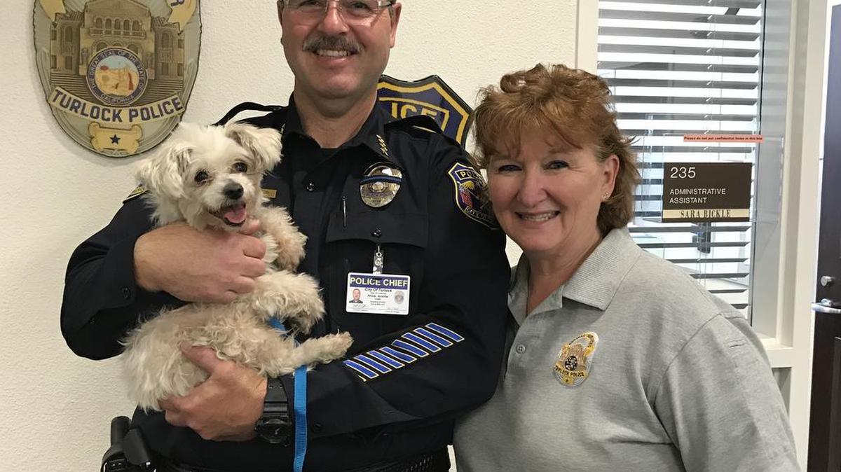 Trixie is pictured with Turlock Police Department Chief Nino Amirfar and Animal Services Supervisor Glena Jackson.