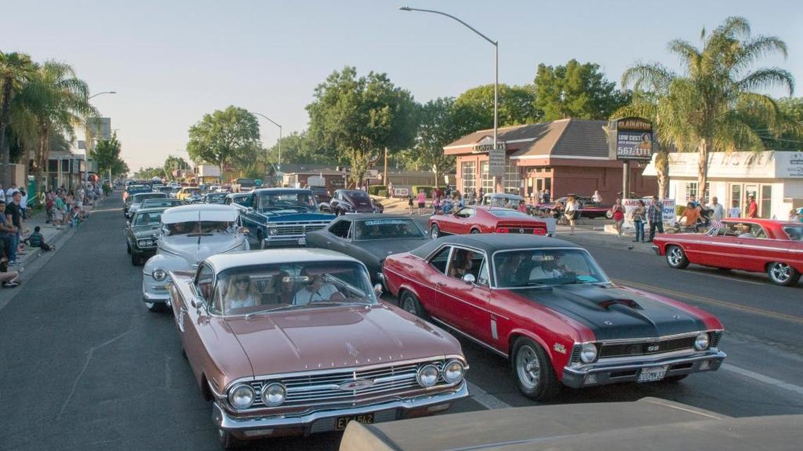 Classic cars prepare for the parade on McHenry Avenue during last year’s Graffiti parade in downtown Modesto.