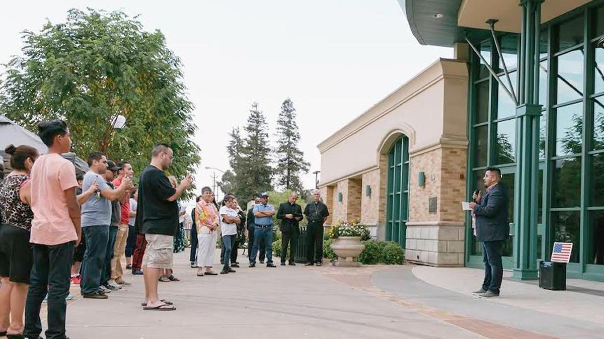 Event organizer Alejandro Romo Carrillo addresses a crowd gathered at Oakdale's Gene Bianchi Community Center Monday evening (08-21-17) to make a statement against white nationalism.