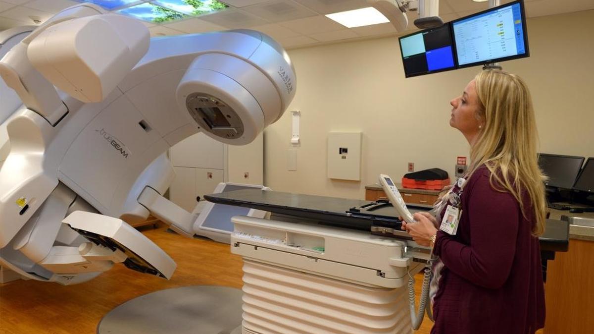 
Jessica Clarkson, assistant department manager in radiation oncology, demonstrates the use of the Varian TrueBeam linear accelerator Tuesday at Memorial Medical Center.
