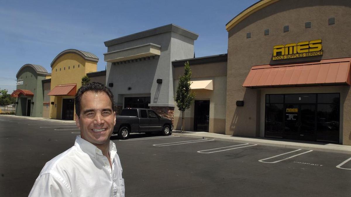 
Real estate investor Andrew Katakis is seen in 2008 in front of Cornerstone Plaza, a retail and office complex that was formerly Roller King, off Briggsmore Avenue.
