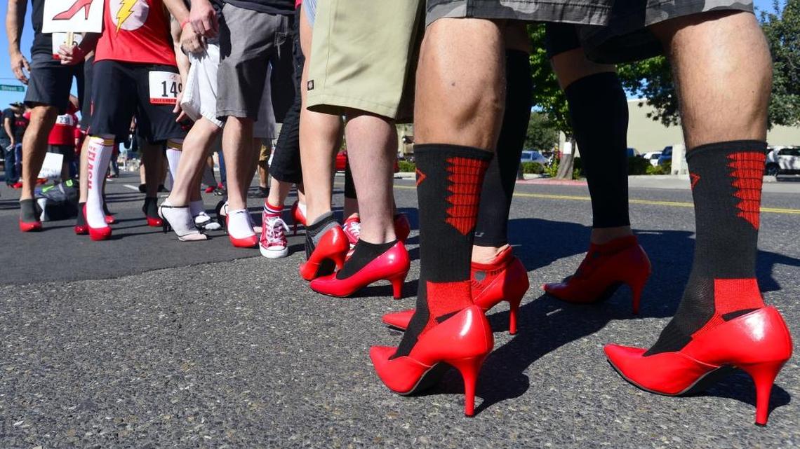 Men wear high heels in support of raising awareness of sexual abuse during the Walk a Mile in Her Shoes event led by the Haven Women’s Center of Stanislaus County in Downtown Modesto California on April 16, 2016.