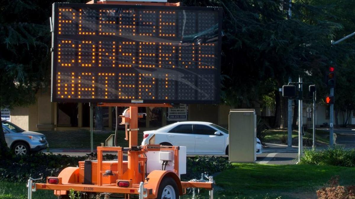 A sign encouraging water conservation on display at Burney and H streets in Modesto, Calif., on Friday, Sept. 30, 2016.