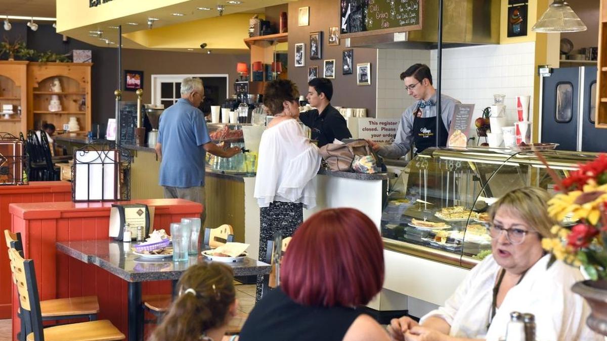 Employees and customers are pictured on Friday afternoon (08-04-17) at Village Baking Company in McHenry Village in Modesto, Calif.