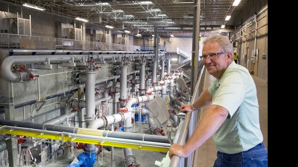 
Water treatment plant manager Pat Ryan looks over the new Membrane Building, which can filter up to 36 million gallons per day and takes up half of the space of the older filtration system, at the Modesto Irrigation District Water Treatment Plant at Modesto Reservoir on July 10.

