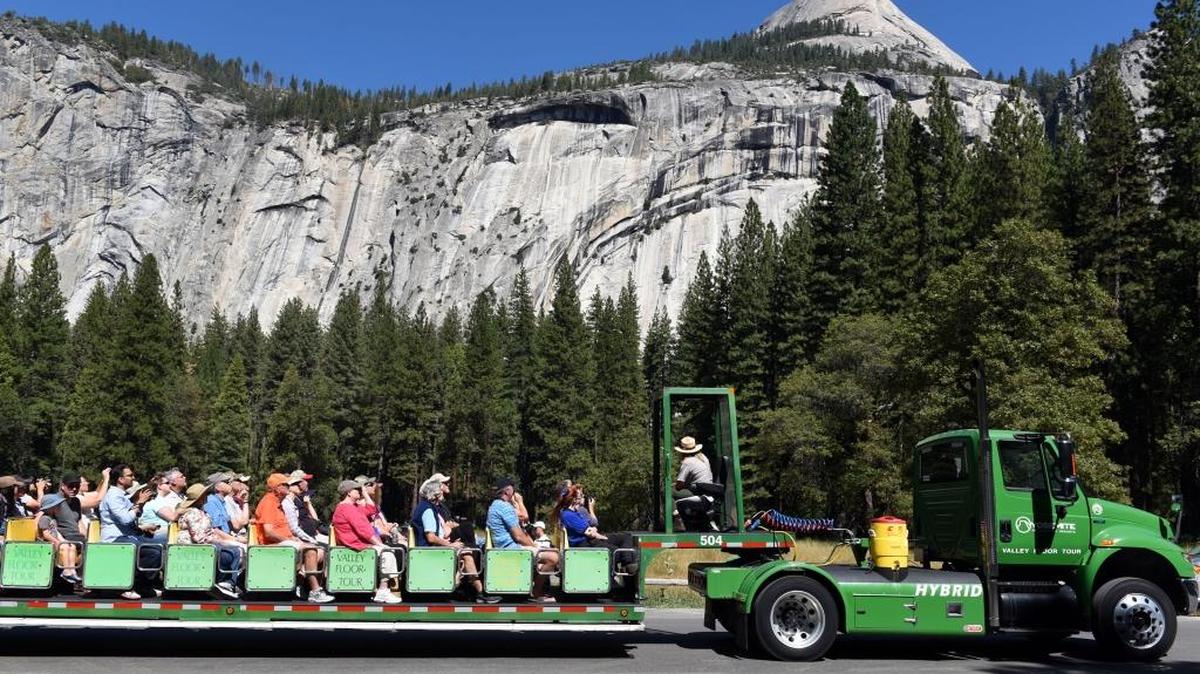 Visitors tour Yosemite National Park in September 2015.