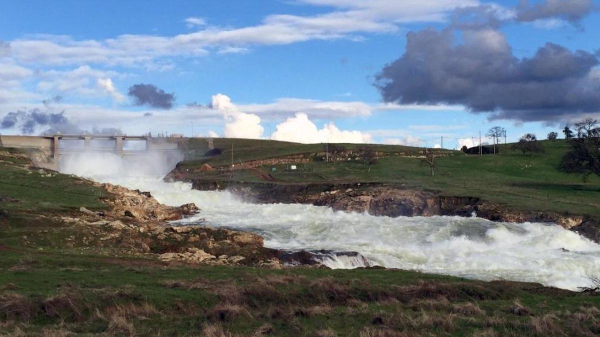 The Don Pedro spillway is seen as the water flows Wednesday in La Grange.