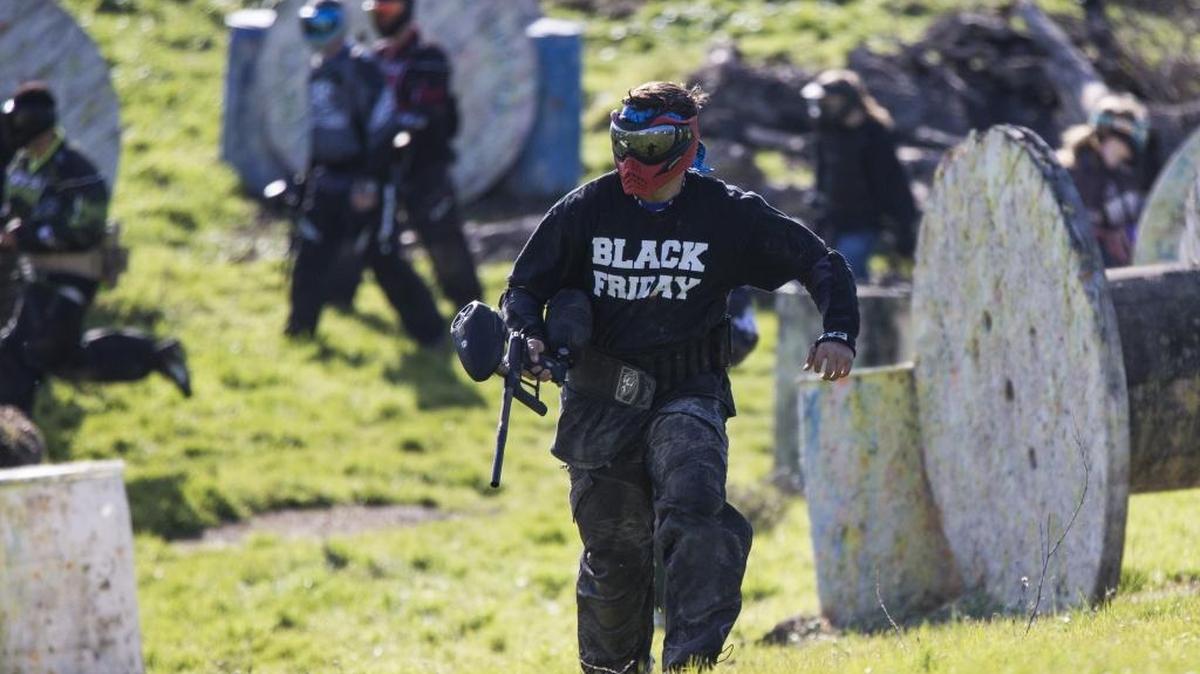 Players run to take cover during the start of the final battle of the morning at Extreme Paintball park Sunday on Dusty Lane east of Modesto. Many players of all ages competed against each other on the field during the event on New Year’s Day.