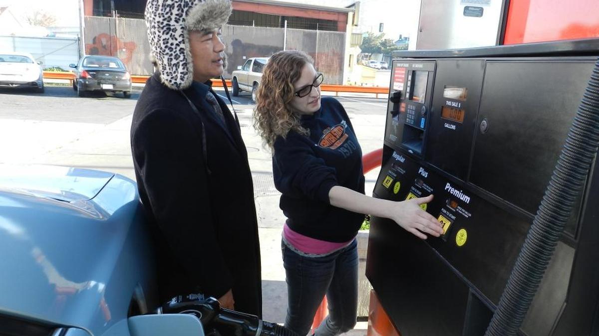 The cheapest gasoline prices in Modesto on Tuesday morning were found at the National station at Sixth and L streets. Manager Nicole Gilson assists customer Rattana Pok at one of the pumps.
