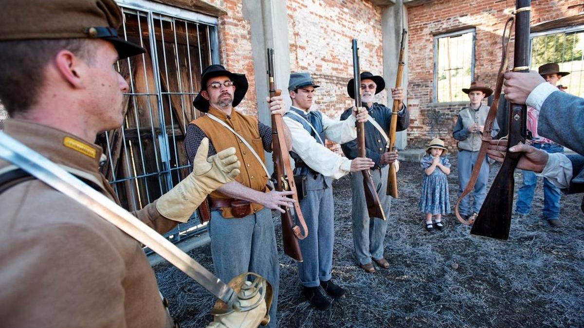 Confederate Stuart Trout, left, trains soldiers, from left, Ted Jones, Logan Olson and John Englent before the last battle of the day during the Civil War Days in Knights Ferry on Saturday.