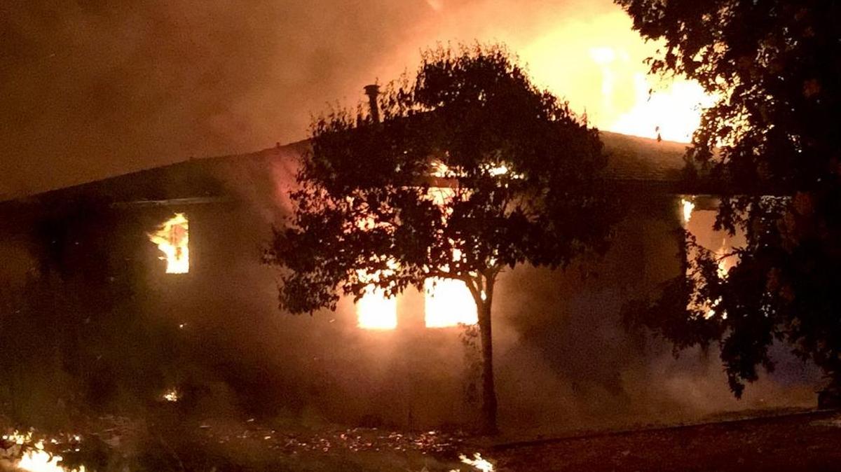 
A building burns in Ceres early Sunday morning.
