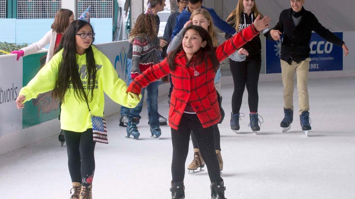 Alyssa Maldonado, right, celebrates her 10th birthday with My Raquel Gonzales, also 10, at Modesto on Ice on Sunday, Dec. 20, 2015.