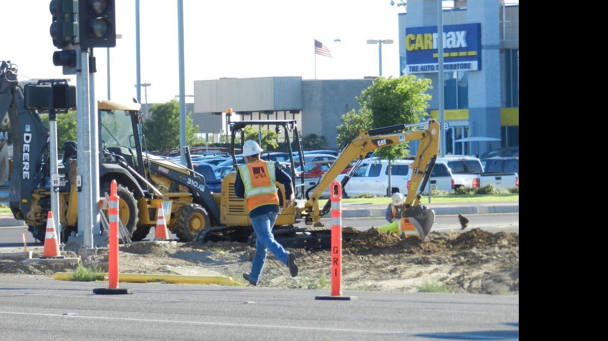 
A PG&E crew works to shut off natural gas after a 4-inch main was broken along Claratina Avenue just east of McHenry Avenue on Monday morning. 
