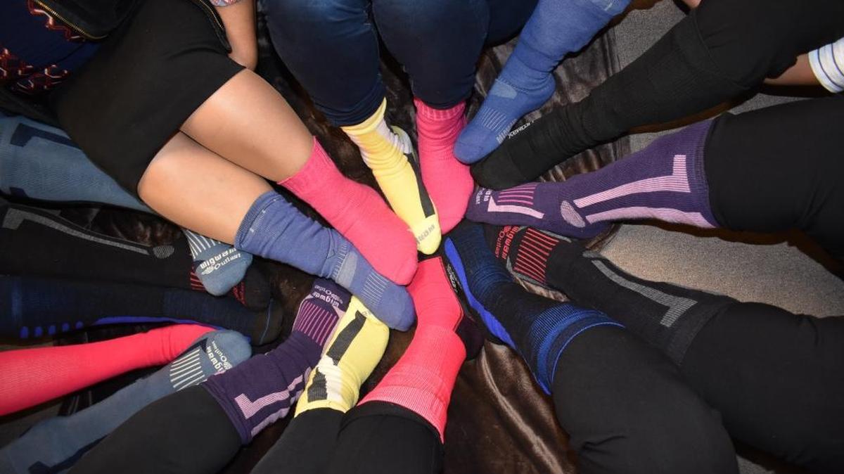 World Down Syndrome Day was observed Tuesday with the Lots of Socks awareness campaign. Here, staff of the Socoety for disABILITIES in Modesto wear a colorful collection.