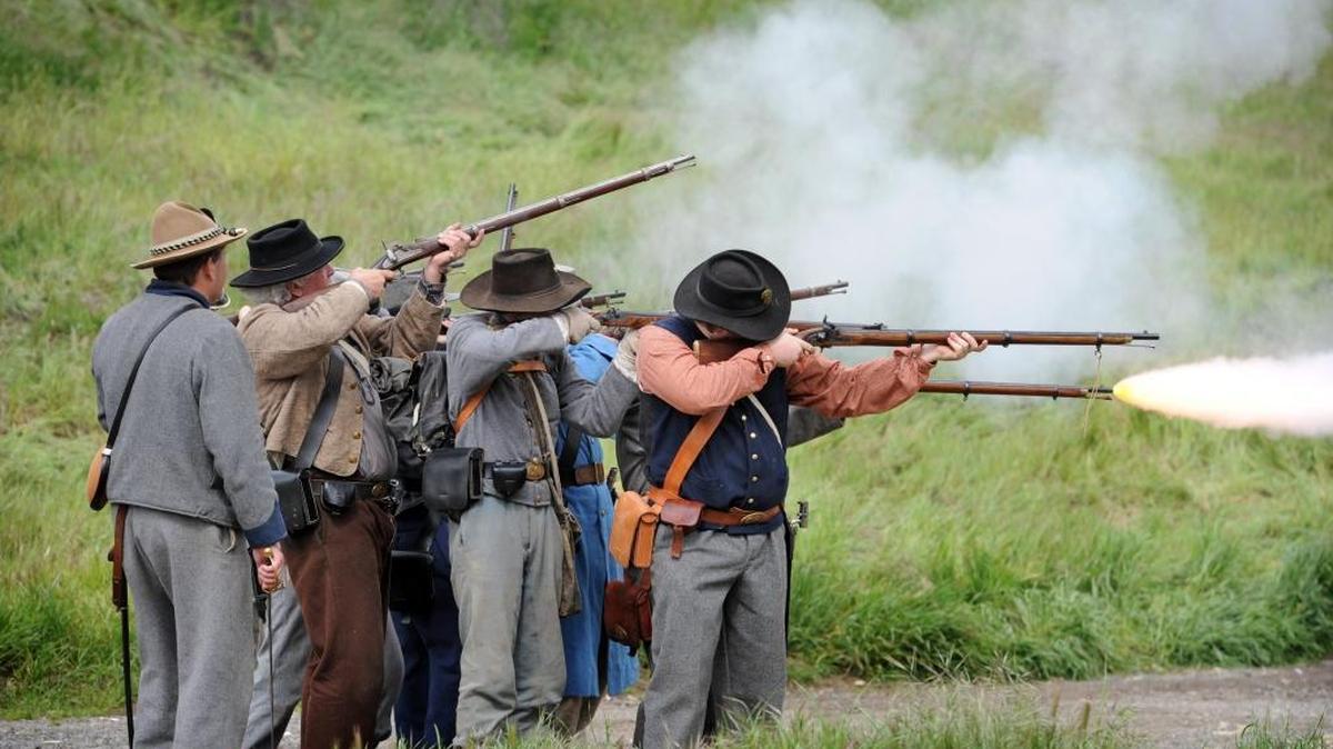 Confederate soldiers shoot during the Civil War re-enactment in Knights Ferry in 2012.