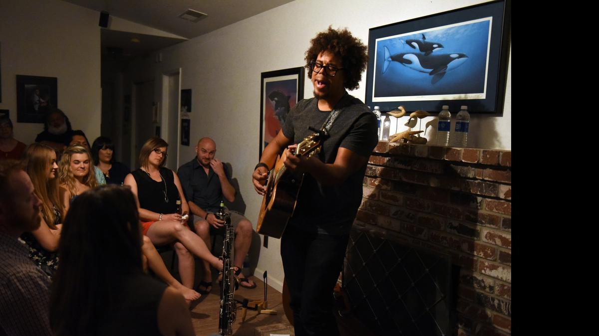 
Jake Clemons performs for guests in the living room of a home in Ceres on Saturday evening. Clemons stopped in Ceres as part of his Living Room tour and played for about 30 guests.
