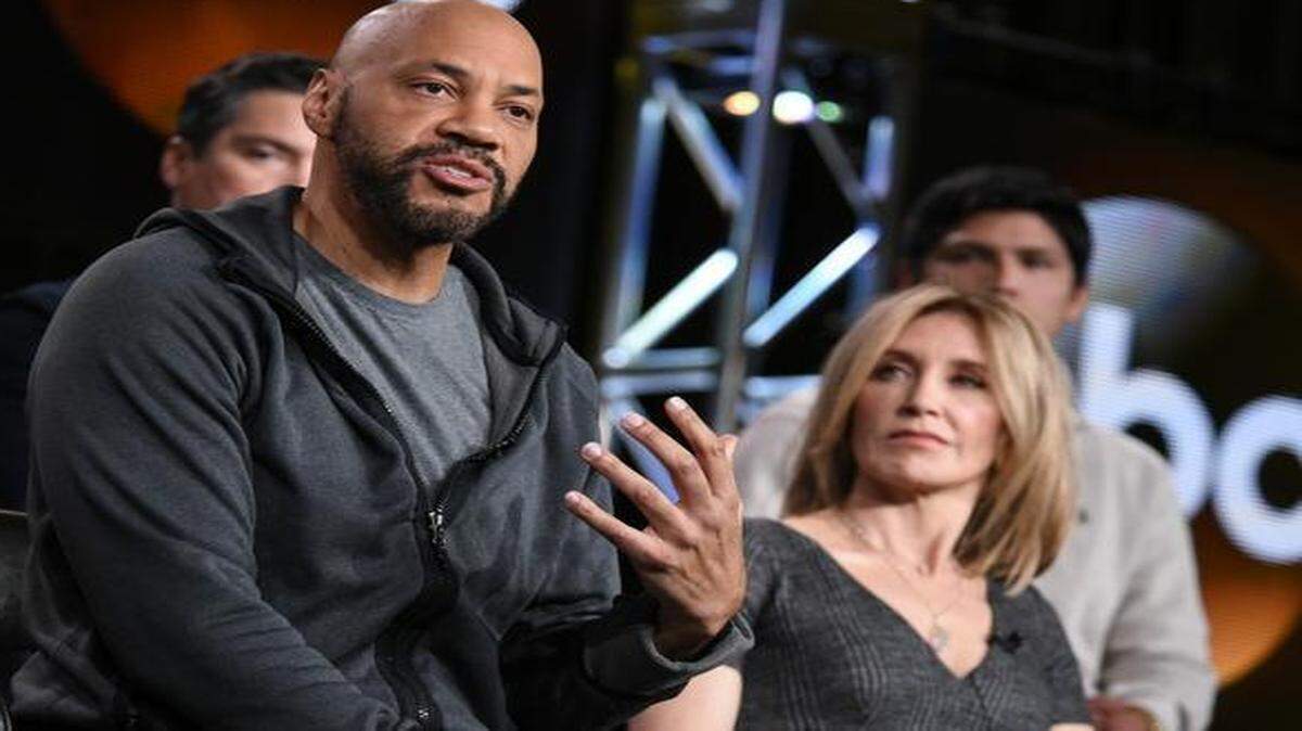 
Creator and Executive Producer John Ridley, left and Felicity Huffman speak on stage during the “American Crime” panel at the Television Critics Association winter press tour, Wednesday, Jan. 14, 2015, in Pasadena.
