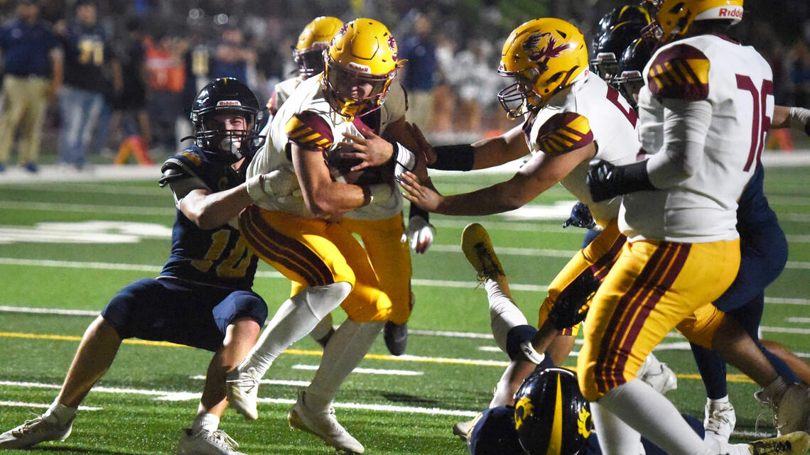 Prep football roundup: Davis, Central Valley spar in triple OT thriller
