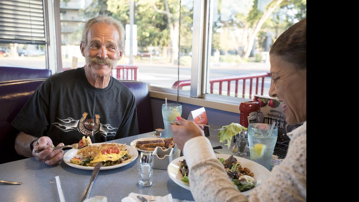 
Billy Swindle enjoys a vegetarian omelet and toast with friend Dede Tafoya at Denny’s Restaurant at Five Points in Modesto on Wednesday.
