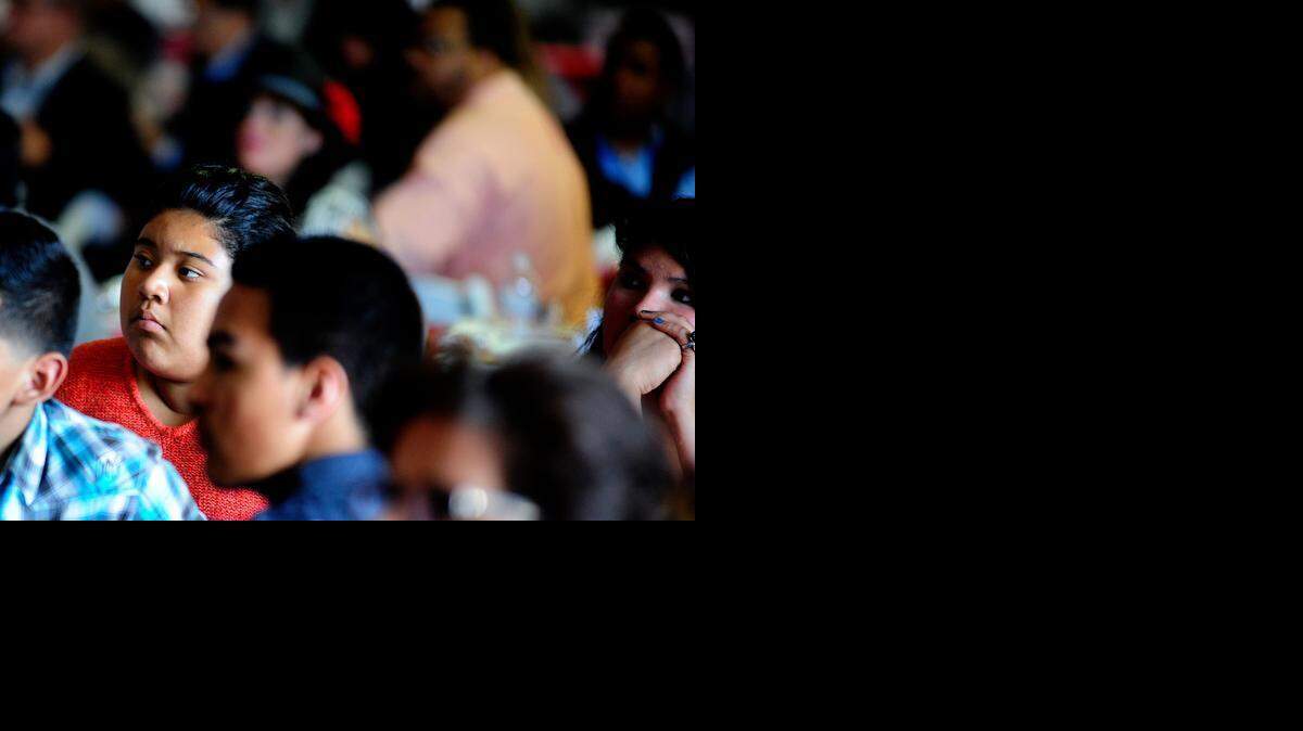 
At left, Cesar Chavez Junior High student Diana Hernandez, 14, of Ceres listens with her classmates to Arturo Rodriguez, president of the United Farm Workers of America, as he speaks at the Latino Community Roundtable’s 14th annual Cesar E. Chavez Si Se Puede Empowerment Luncheon on Thursday  in Modesto.
