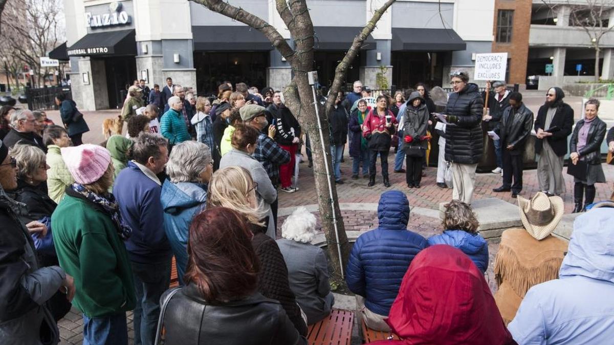 A large group of people showed up for a Compassion and Solidarity Vigil at Tenth Street Plaza in downtown Modesto on Sunday.