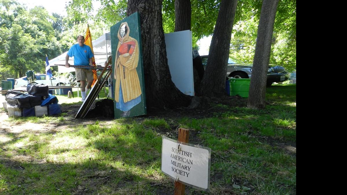 
David Wolff of the St. Andrew’s Society of Modesto sets up at Tuolumne River Regional Park on Friday  in preparation for the Modesto Scottish Highland Games and Celtic Faire happening Saturday.
