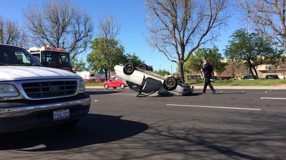 A silver Toyota Corolla overturned onto its roof after colliding with a white Ford F-150 pickup on Dale Road, just south of Veneman Avenue in north Modesto, Calif. on Sunday morning (March 12, 2017).