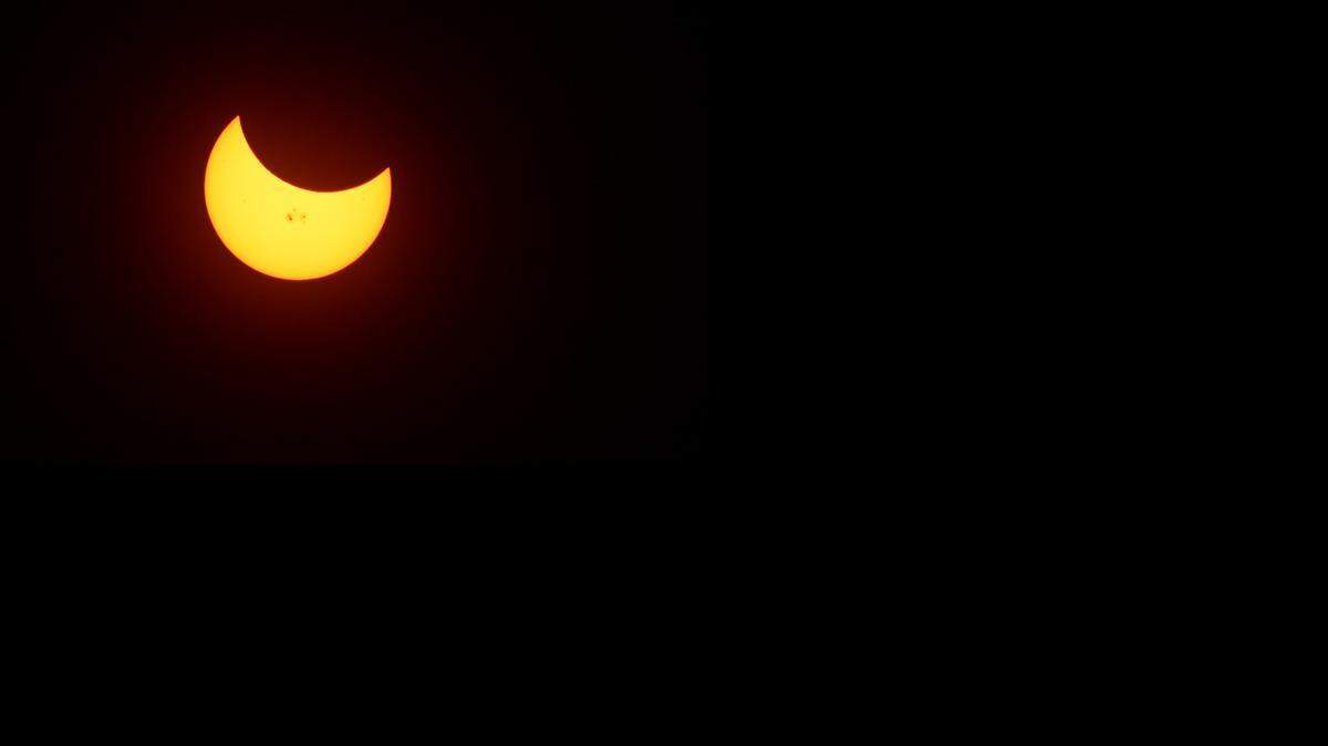 
The partial solar eclipse on Thursday afternoon from Modesto is photographed through a special solar filter.
