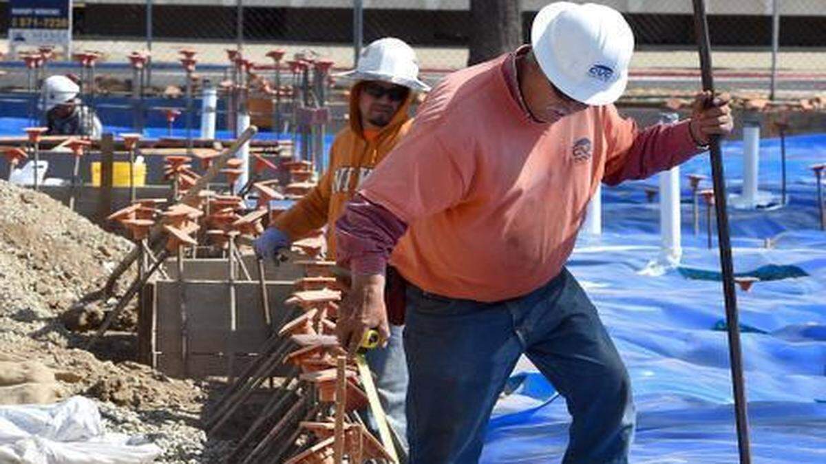 
Reymundo Gonzalez, front, and Juan Cervantes with CVC prep footings for rebar Tuesday morning at the Tower Park Senior Housing site at 17th and G streets in Modesto. There was a groundbreaking Tuesday morning for the project.


