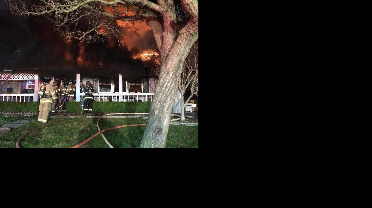 
Firefighters battle a blaze on Columbia Way in Modesto on Wednesday night. Jan. 28, 2015
