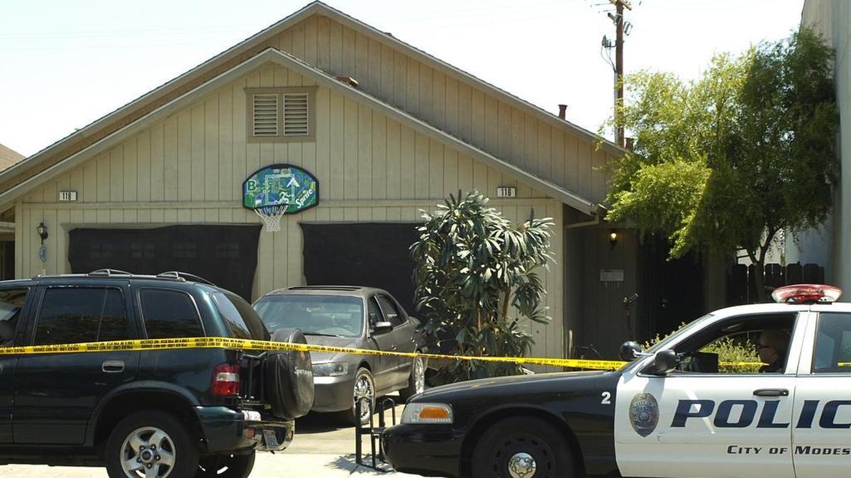 Modesto police officers investigating a July 28, 2009, shooting at a home in the 100 block of Santa Barbara Avenue in Modesto’s La Loma neighborhood. Epifanio Ramirez Jr., 10, and Jason Cyphers, 29, were killed at the home, but they were not the intended targets.