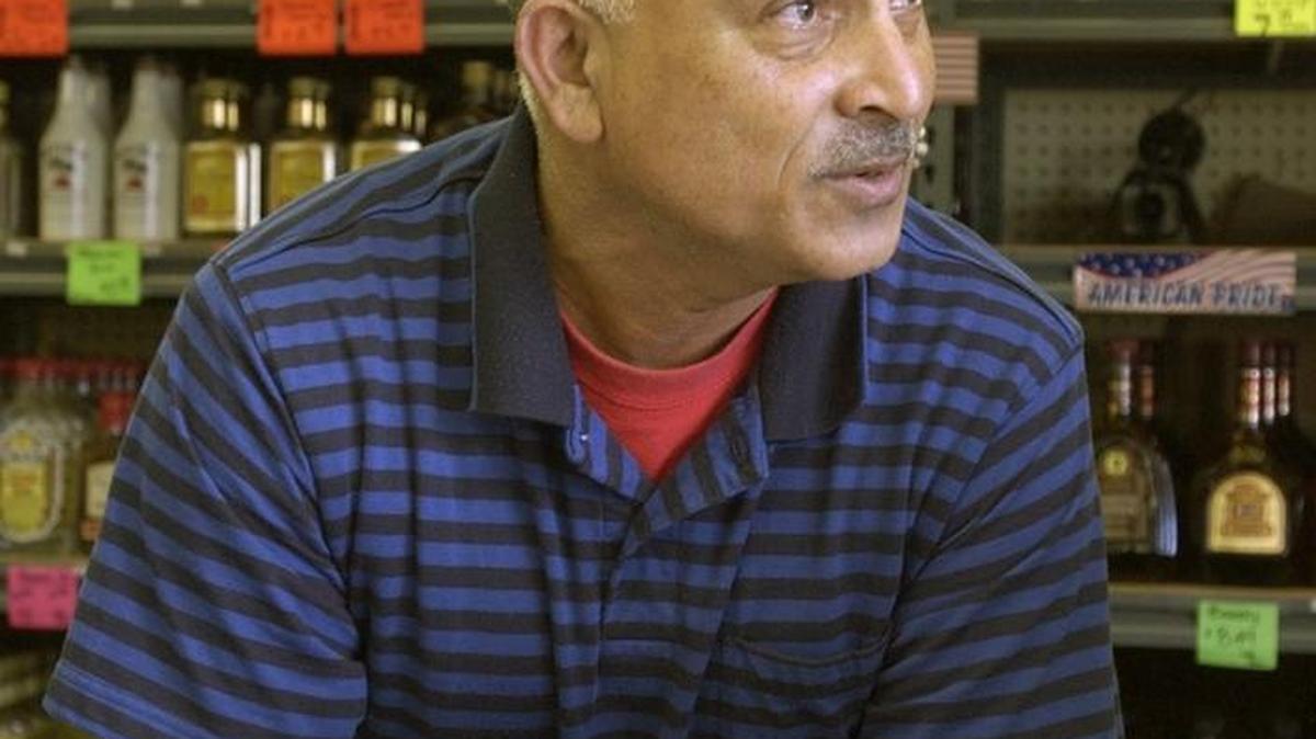 BK’s Liquor owner Balbir Boyal talks in April 2004 about the $1.98 a gallon gas price at his store.