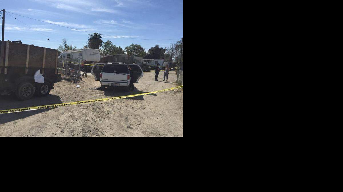 
Detectives investigate a fatal stabbing on South Seventh Street in south Modesto March 19, 2015.
