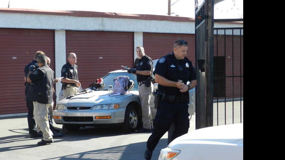 
Modesto police investigate at Orangeburg Mini Storage on Wednesday morning  after three people were taken into custody in connection with a rash of burglaries.
