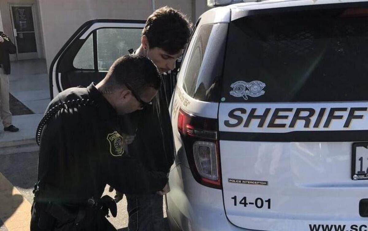 Miguel Morales, 19, was arrested for domestic violence and negligent discharge of a firearm.