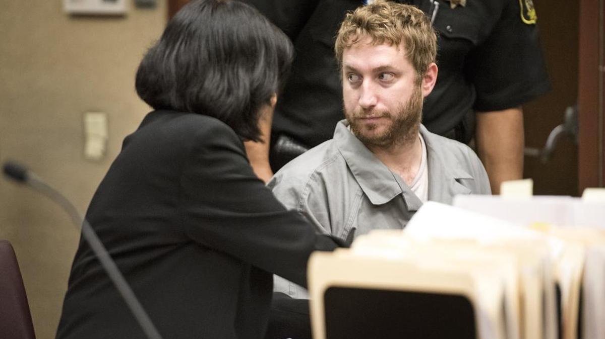 Matthew Nicholson looks over at members of his family during an arraignment hearing at the Stanislaus County Courthouse in Modesto on Wednesday, Jan. 17, 2018. Nicholson is accused of killing his mother Susanne during an argument.