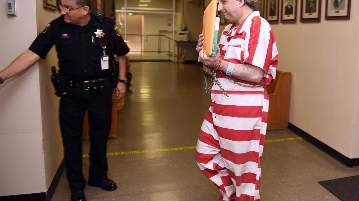 Mark Edward Mesiti walks into Department 1 of the Stanislaus County Superior Courthouse in Modesto, Calif. on Friday, Oct. 9, 2015. Mesiti, accused of the 2006 murder of his 14-year-old daughter, is asking to have his writing hand uncuffed while he meets with his legal team to prepare his defense.