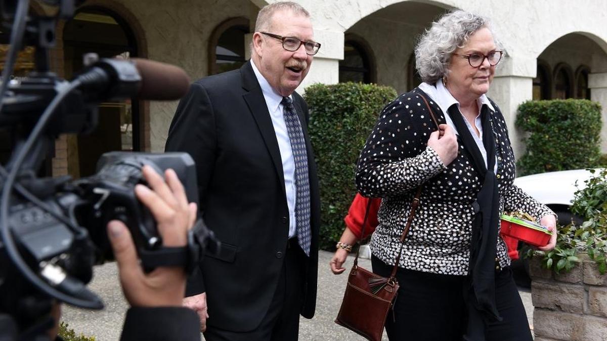 Frank Carson and his wife, Georgia DeFilippo, leave after appearing in Superior Court in Modesto, Calif., on Jan. 3, 2017, for a status conference of a preliminary hearing.