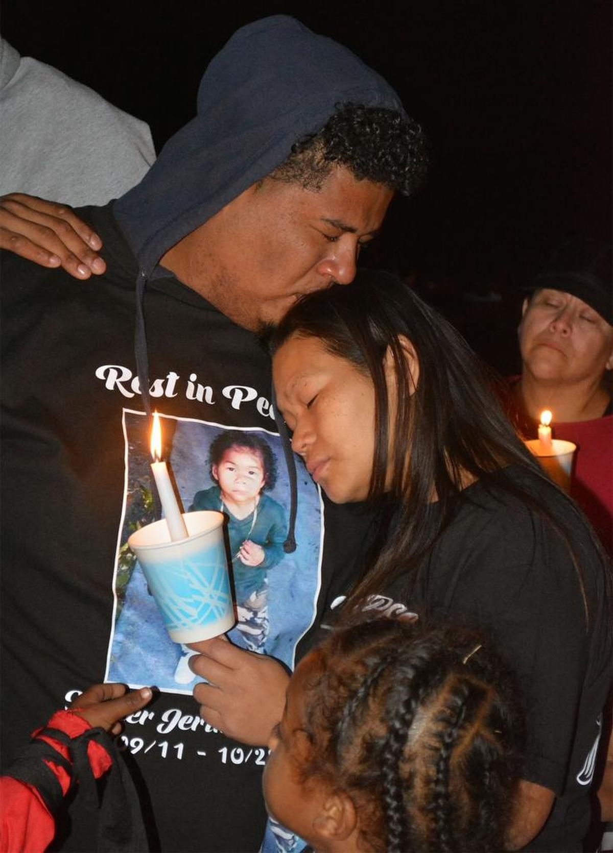 Marcus Smith and Tiffany Moun take part in a remembrance of their son, Xavier Smith, 5, at Mellis Park in Modesto, Calif., on Tuesday (10-31-17).