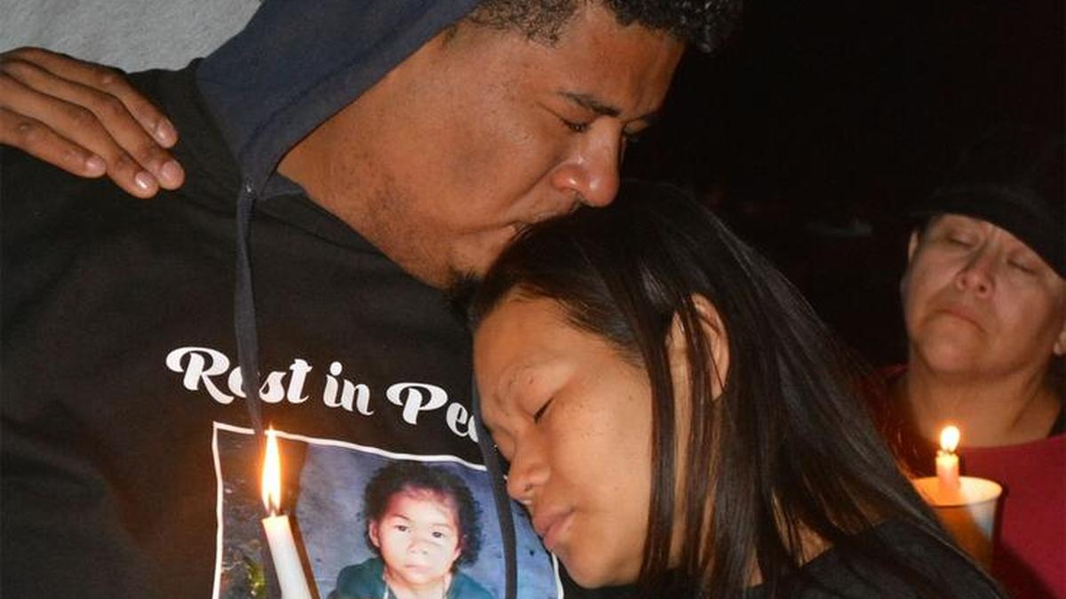 Marcus Smith and Tiffany Moun take part in a remembrance of their son, Xavier Smith, 5, at Mellis Park in Modesto, Calif., on Tuesday (10-31-17). 