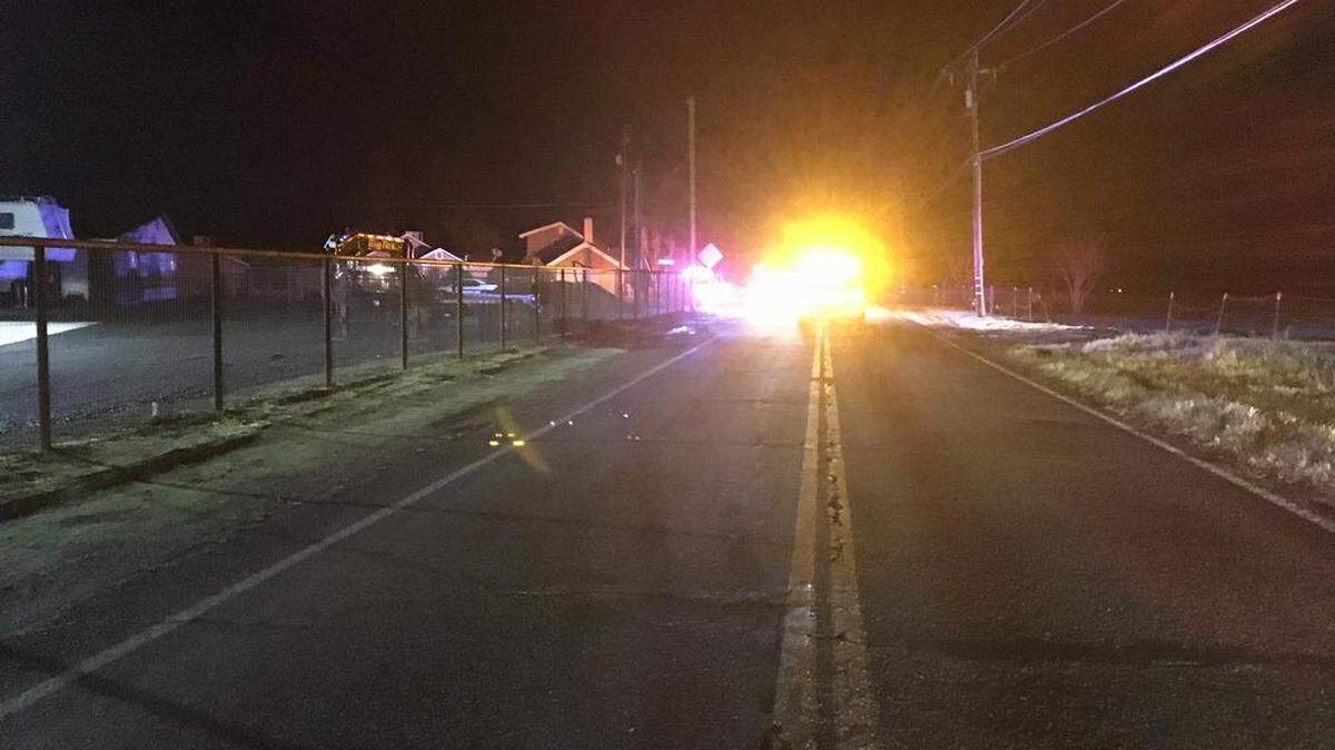 Police officers investigate a crash Saturday night March 25, 2018, after a motorcyclist lost control and crashed into a fence near South Stearns and Twildo roads in Oakdale, California.