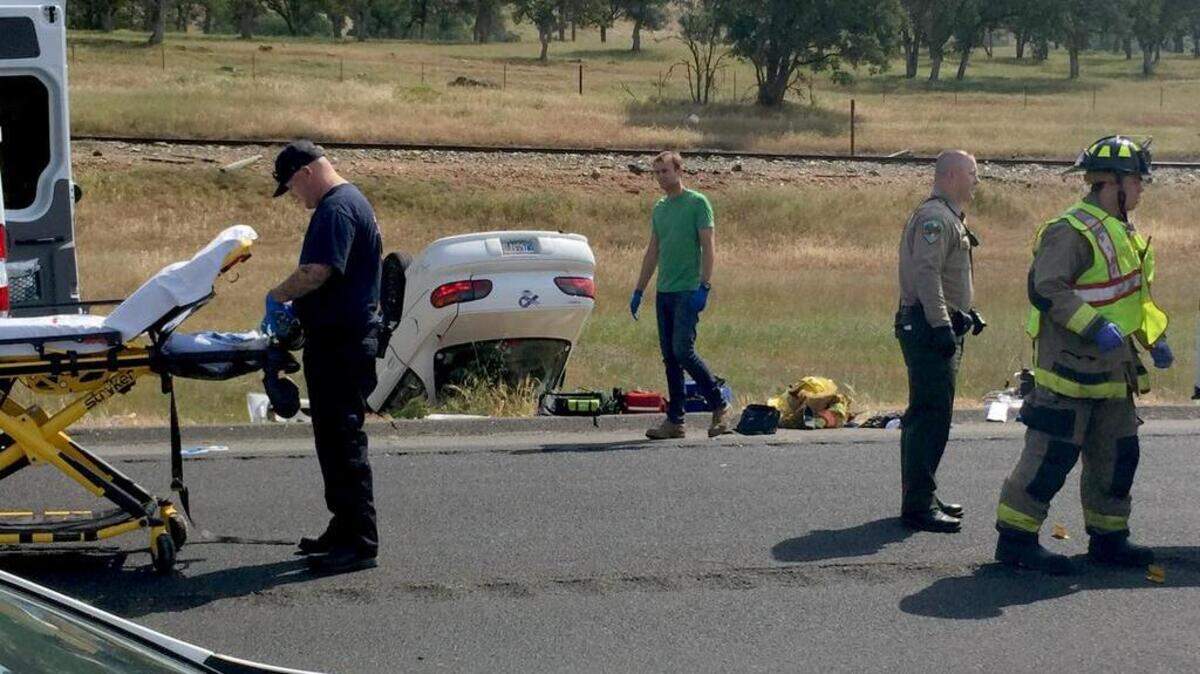 
Emergency personnel are seen at the scene of a suspected drugged-driving crash on Highway 120/108 on Tuesday in which a man was killed and four people suffered major injuries.
