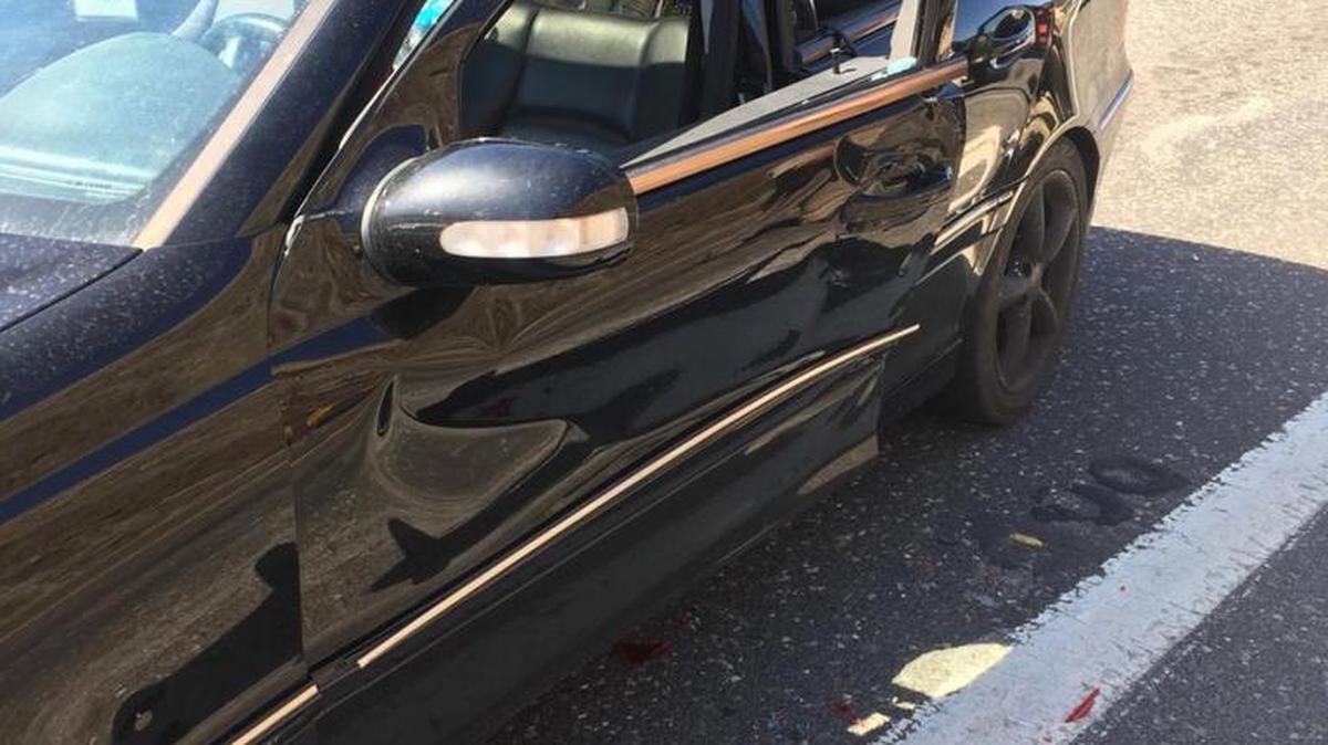 The driver of this Mercedes sedan was airlifted to a Modesto hospital for trauma care after being rammed while standing outside the car during a road-rage incident near Sonora on Thursday.