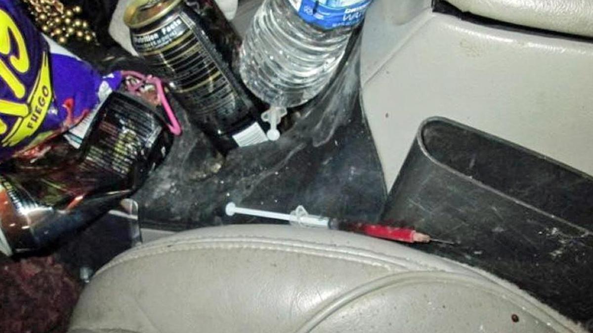 On Tuesday, Nov. 8, 2016, a Tuolumne County deputy searched the car and found 10 used hypodermic needles, a package of unused hypodermic needles, a container with a small amount of black tar substance wrapped in plastic, a bent spoon with a cotton ball and a red explosive device that appeared to be an M-80 type explosive.
