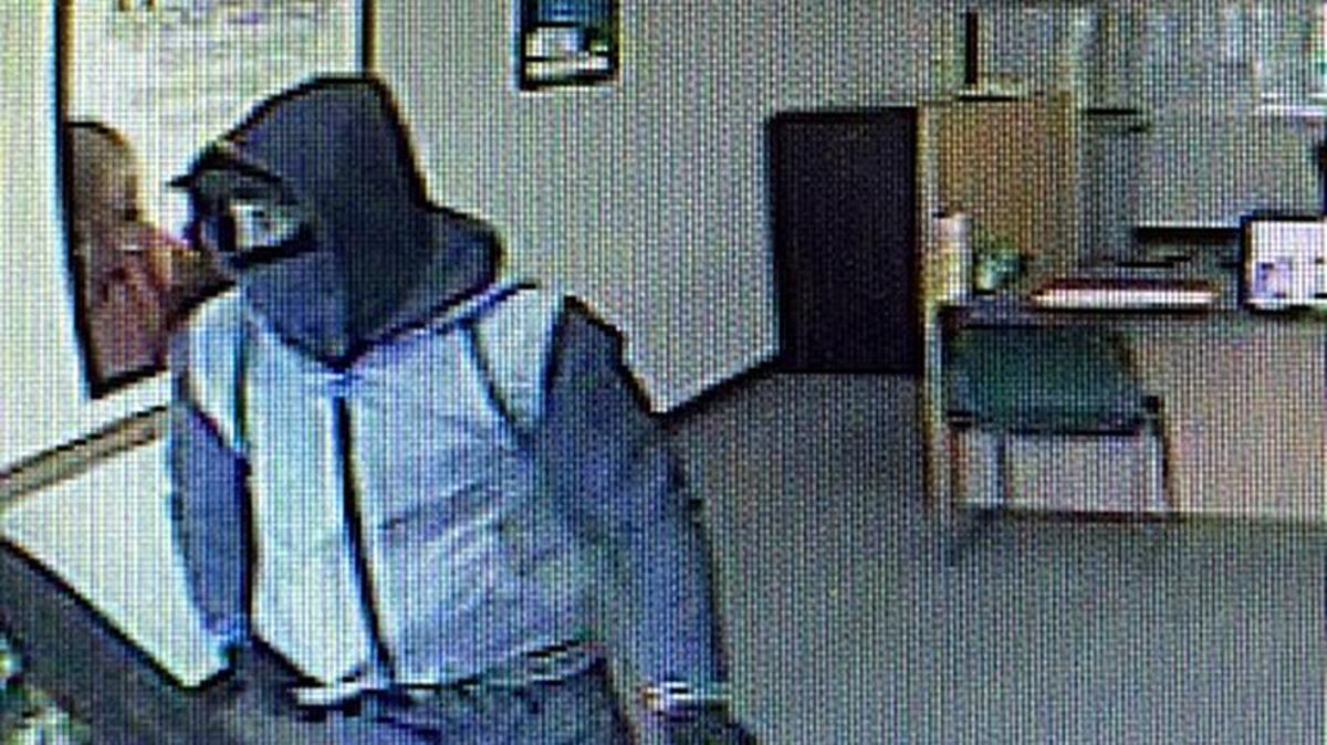 This is surveillance video from a bank robbery at the Check 'n Go in the 2100 block of Standiford Avenue in Modesto, Calif., on Friday, Dec. 11, 2015.
