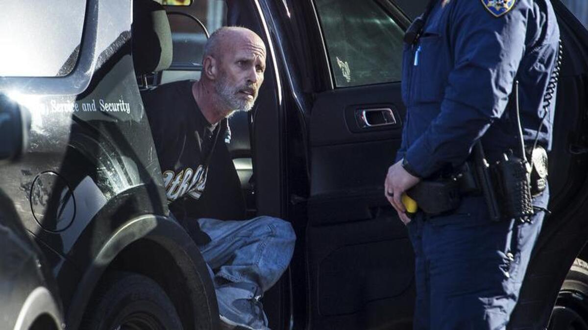 CHP officers arrest a car theft suspect outside the American Budget Inn & Suites on Kansas Ave in Modesto, Calif., on Monday, Dec. 26, 2016. Officers identified the truck, which was reported stolen in November, and tailed the suspect into the motel parking lot where he was taken into custody without incident.