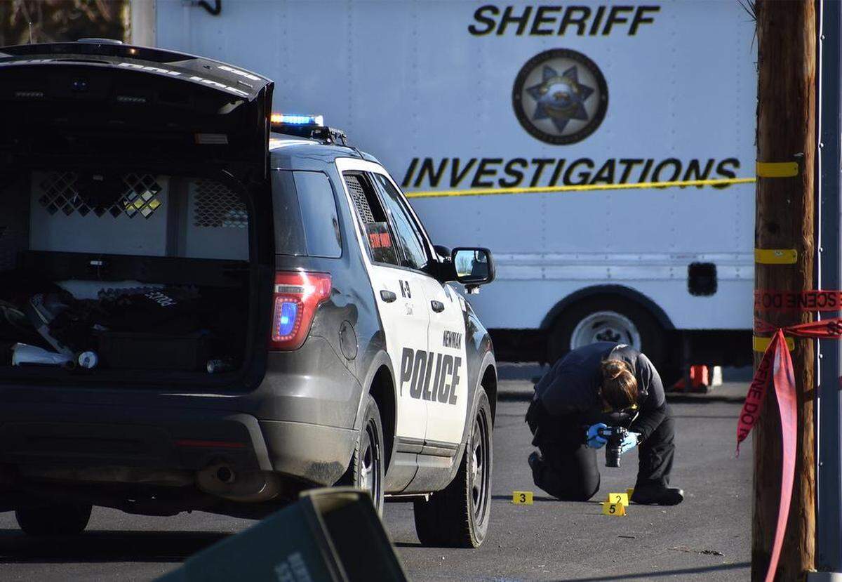 A Newman police officer, Ronil Singh, was fatally shot early Wednesday morning, Dec. 26, 2018, while conducting a traffic stop on Merced Street at Eucalyptus Avenue. Here, evidence is photographed in front of Singh’s vehicle, which remains where he parked it for the traffic stop.