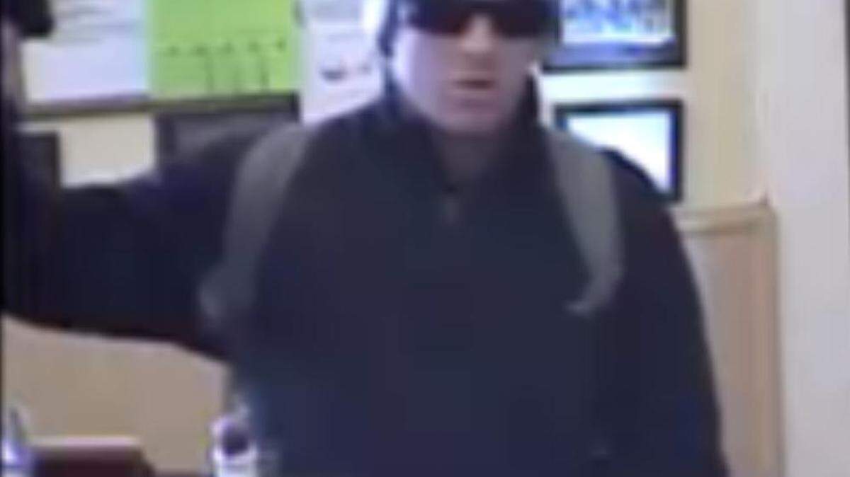 Security camera image of an armed robber at Yosemite Bank on Main Street in Groveland, California on Tuesday (Dec. 5, 2017). FBI believes he's the "Khaki Bandit," who is responsible for 13 bank robberies in rural towns throughout California.
