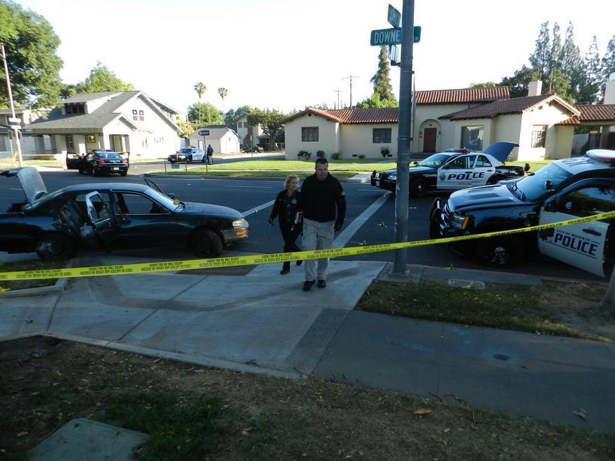 The scene on Downey Avenue in downtown Modesto on Monday morning after an officer-involved shooting late Sunday.